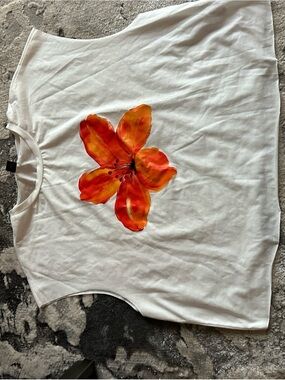 White Sleeveless Top with Orange Floral Print